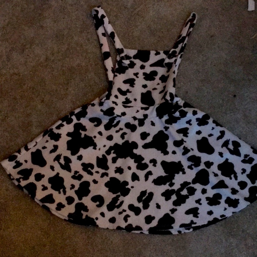 Overall dress cow print with pockets.